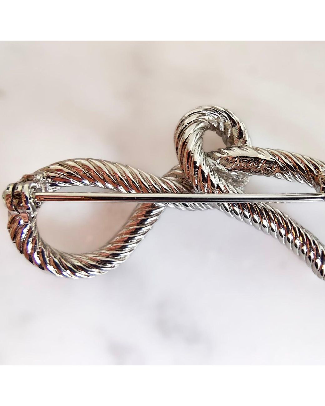Grosse Metallic Platinum Loop Brooch, Series Trésor