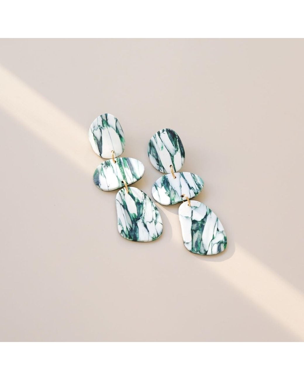 By Chavelli Green Celestia Dangly Earrings
