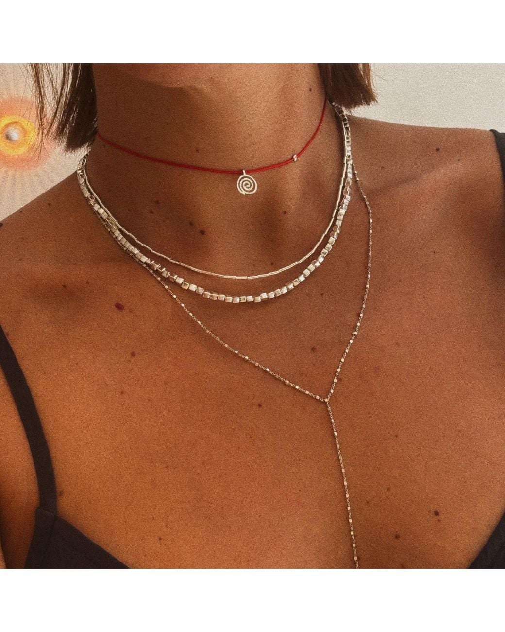 The Pheia Metallic Spiral String Necklace