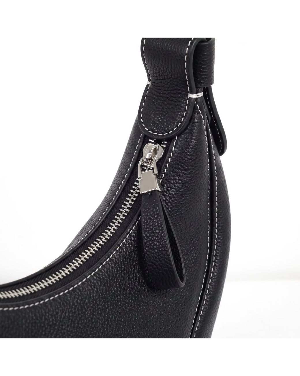 Modenaire Black Curved Shoulder Bag With Sculpted Silhouette And Zip Closure