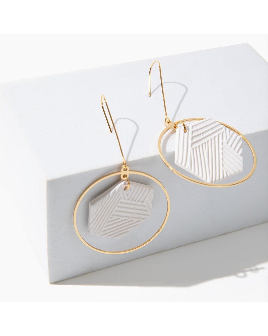 By Chavelli White Hexagon Halo Dangly Earrings