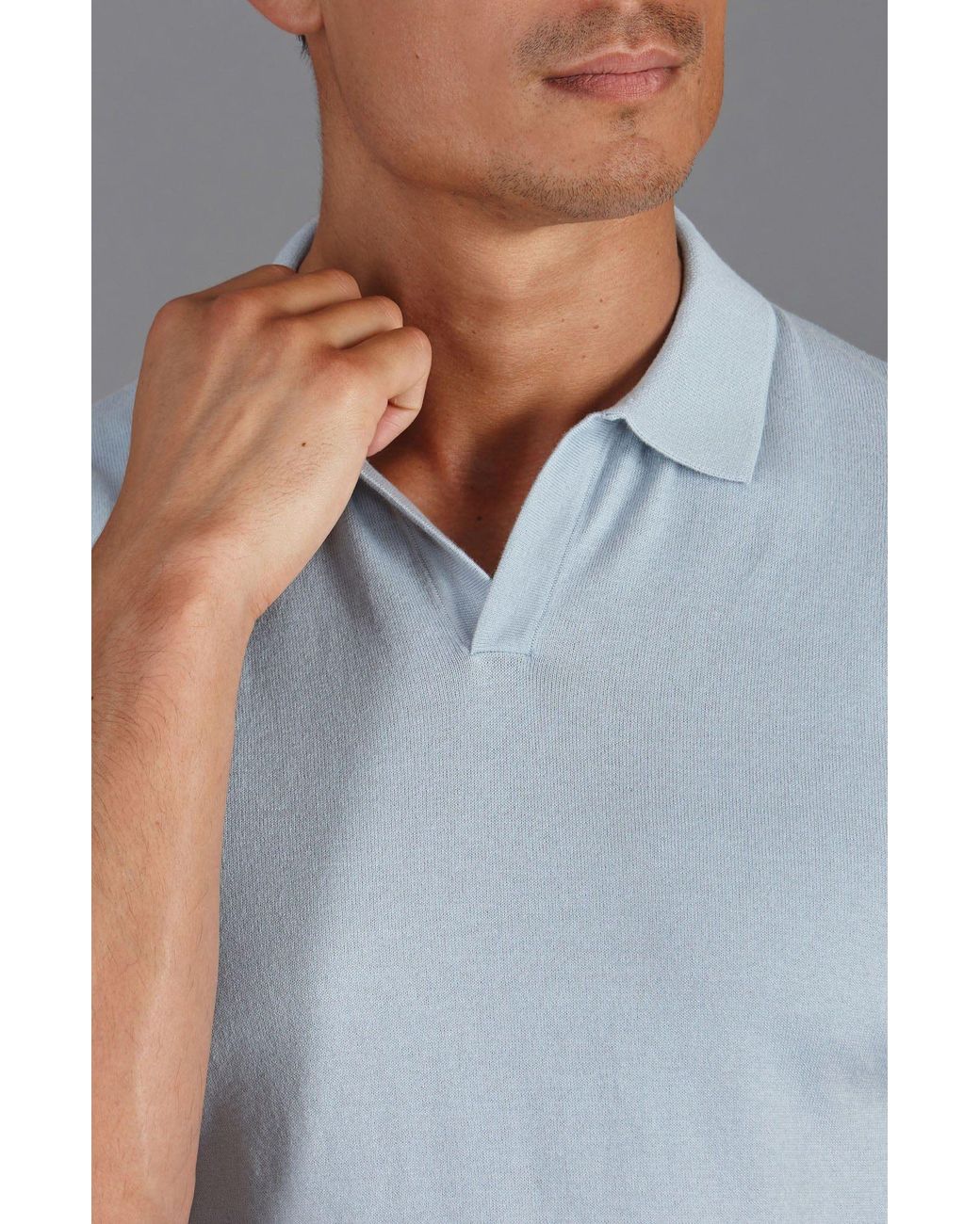 Paul James Knitwear Blue Ultra Fine Cotton Nathan Buttonless Polo Shirt for men