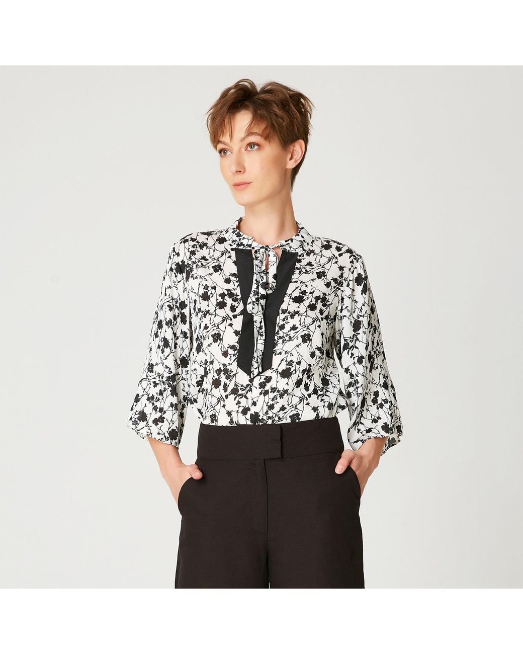 Smart and Joy Black Tulip Sleeves Blouse With Monochrome Floral Print