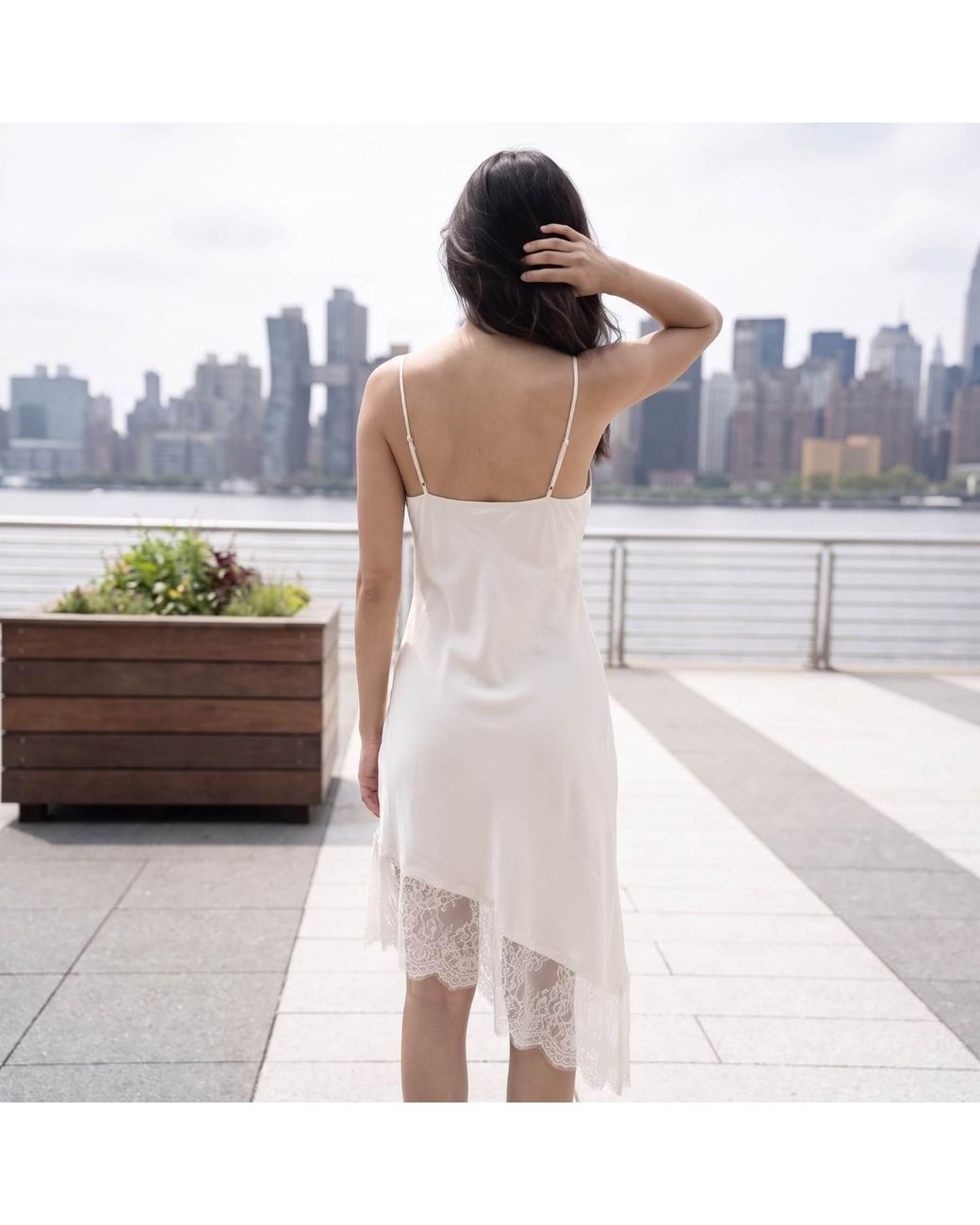 Modenaire White Asymmetric Satin Slip Dress With Lace Trim And Draped Silhouette