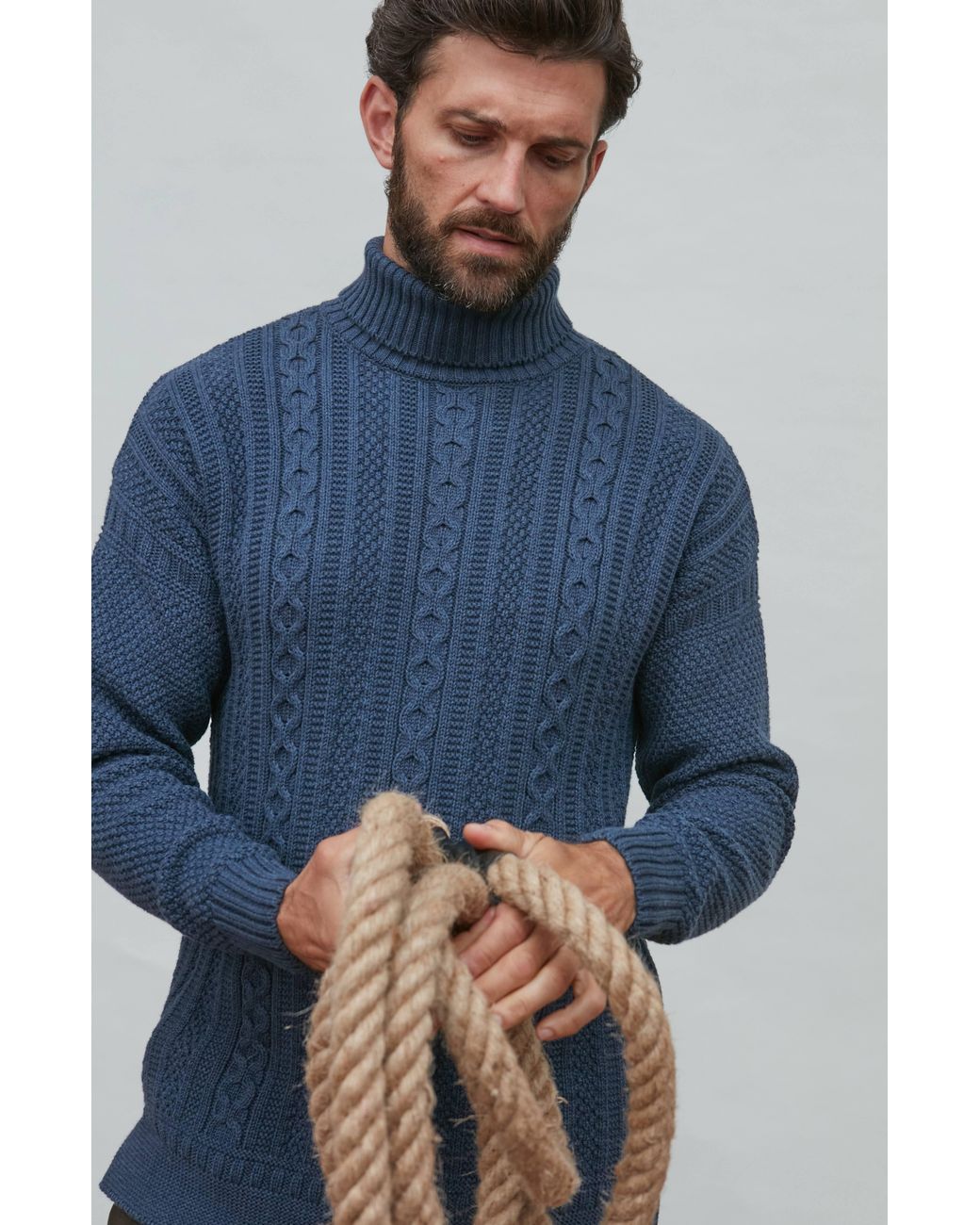Paul James Knitwear Blue Midweight Cotton Aith Cable Roll Neck Gansey Jumper for men