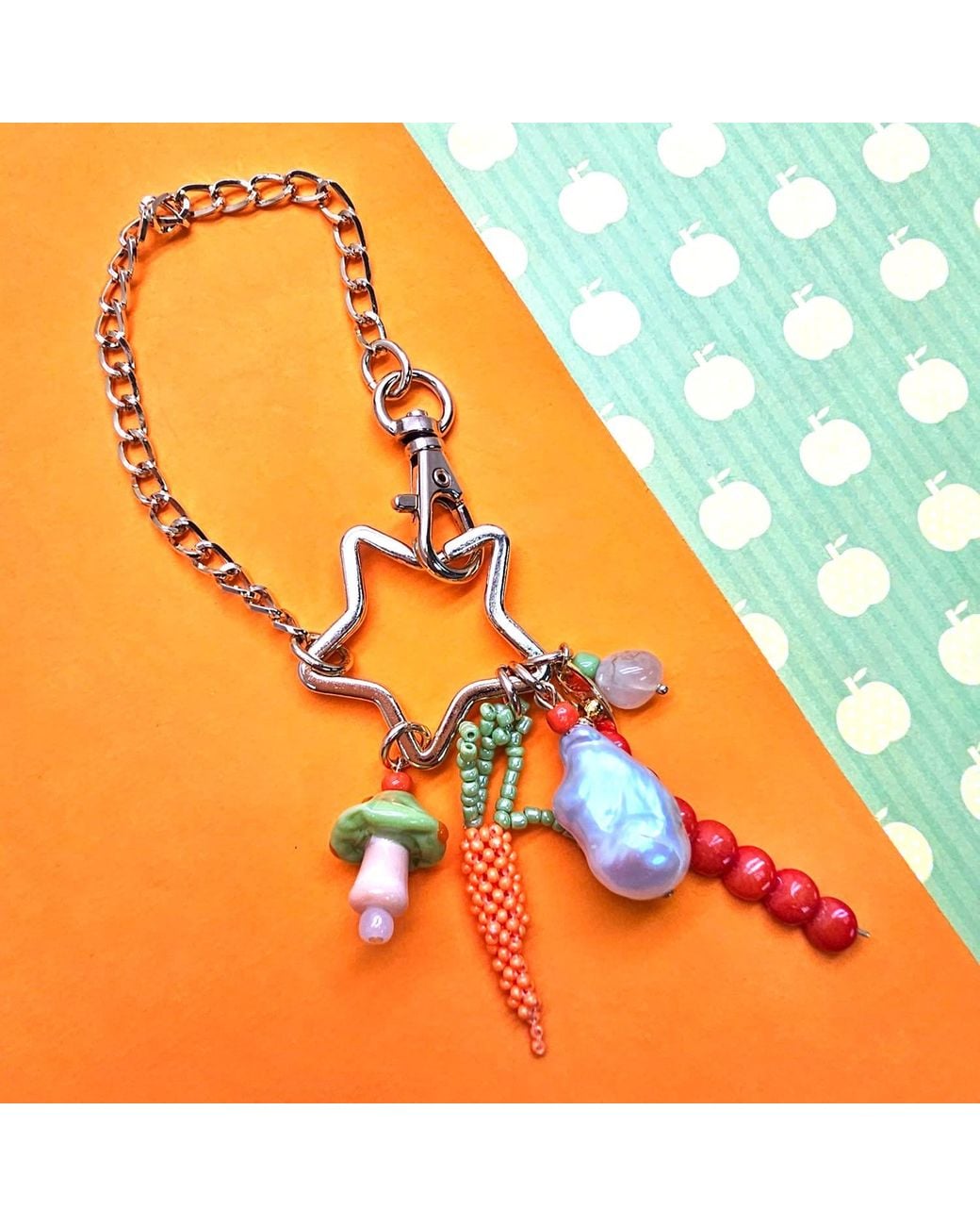 Farra Metallic Baroque Pearl Bamboo Coral And Handcrafted Carrot Bag Charm