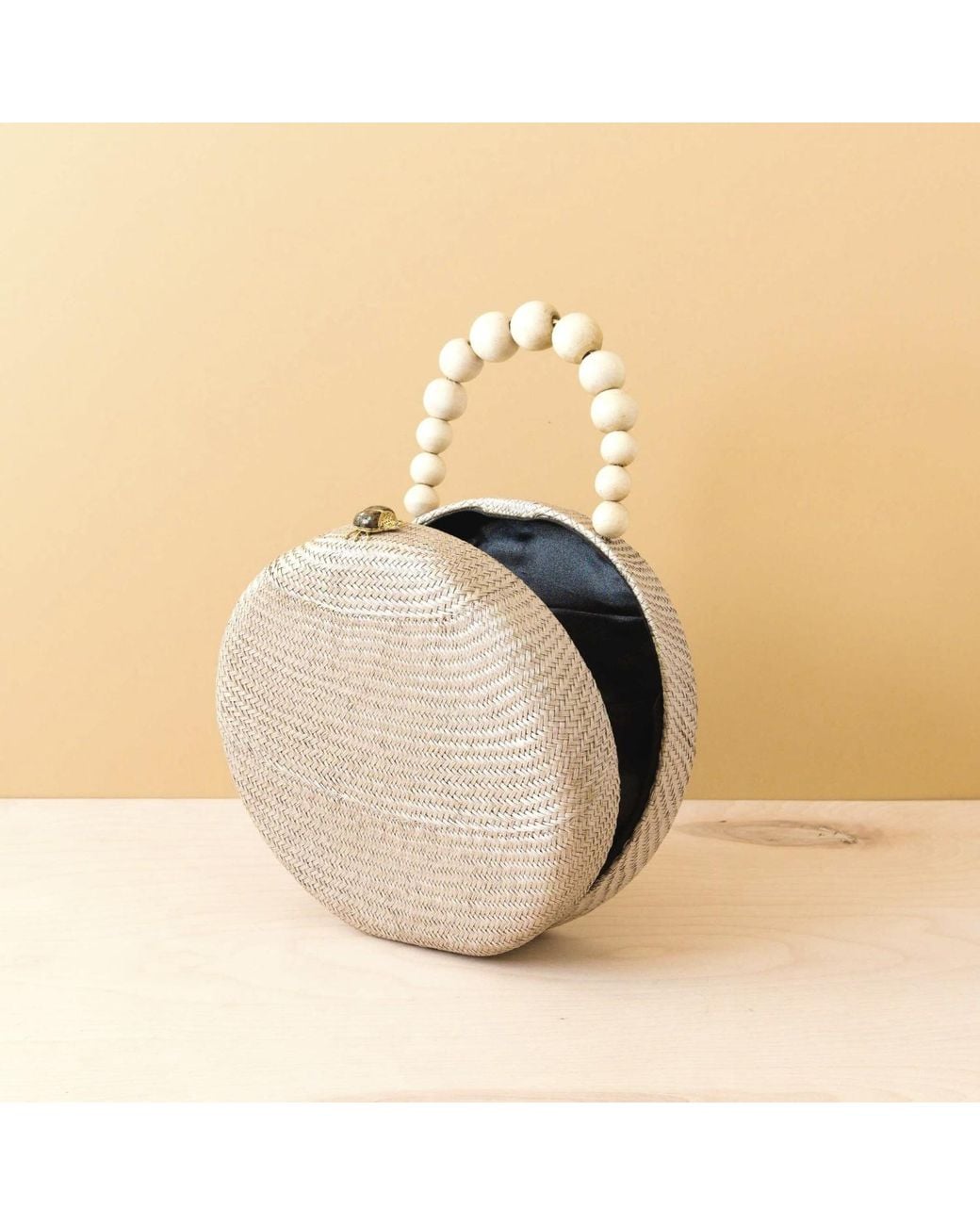 LIKHÂ Natural Neutrals Dusty Rose Round Classic Handbag With Wood Bead Handle