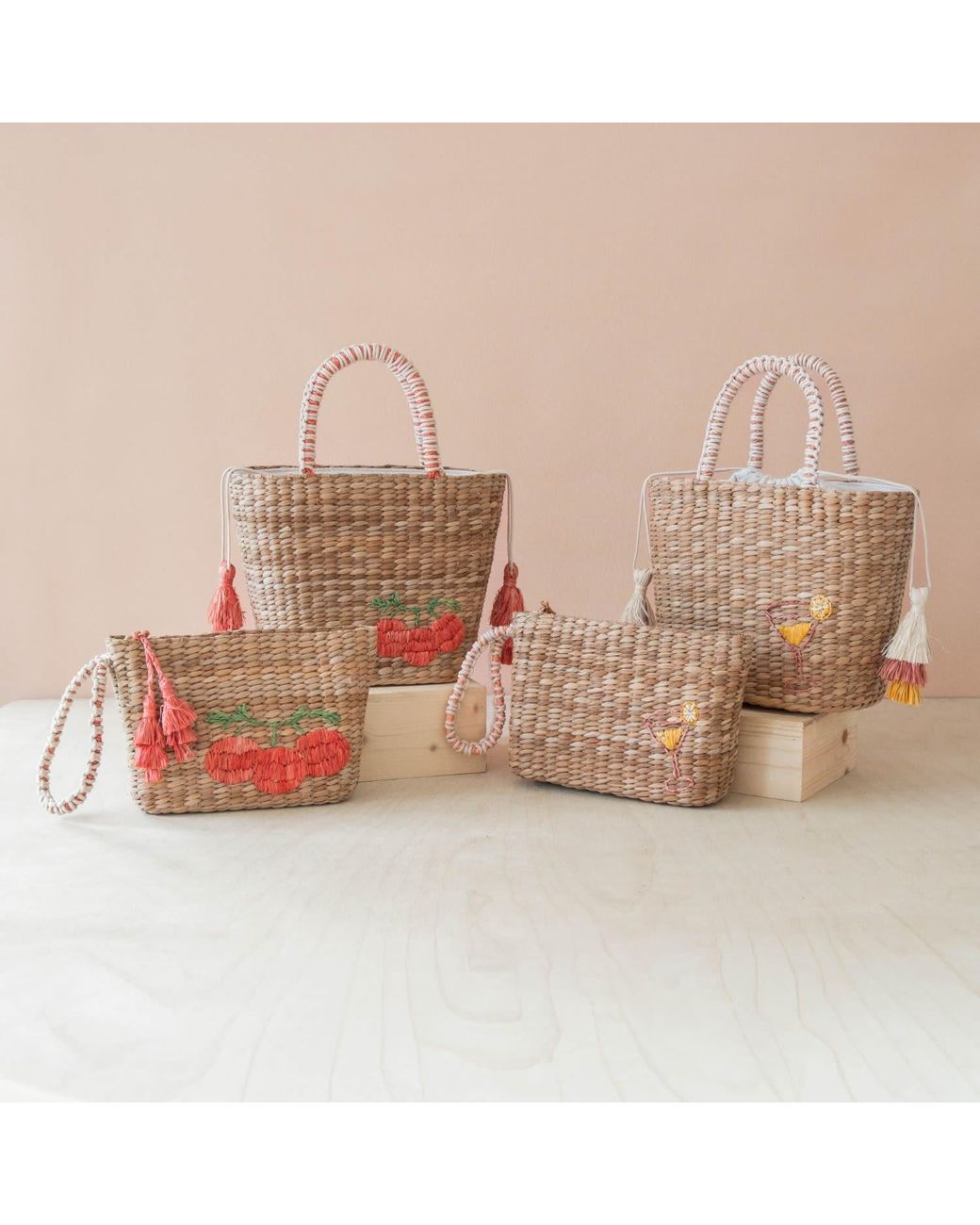 LIKHÂ Pink Neutrals Handwoven Seagrass Tomato Tote Bag With Tassels