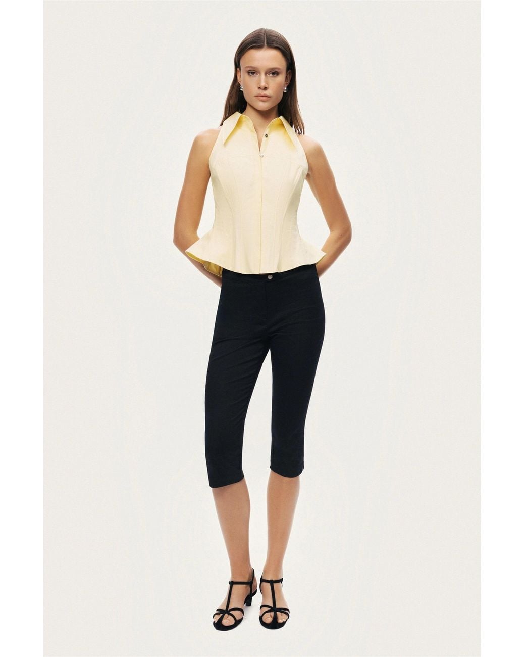 Nocturne White Sleeveless Sculpted Shirt