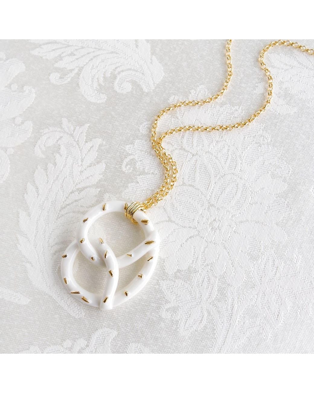 POPORCELAIN Metallic Golden Salted Porcelain Pretzel Pendant Necklace
