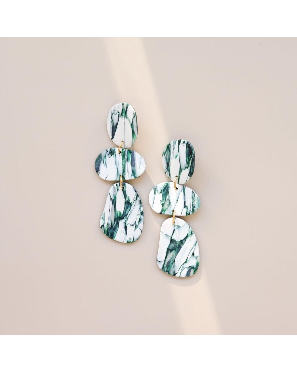 By Chavelli Green Celestia Dangly Earrings
