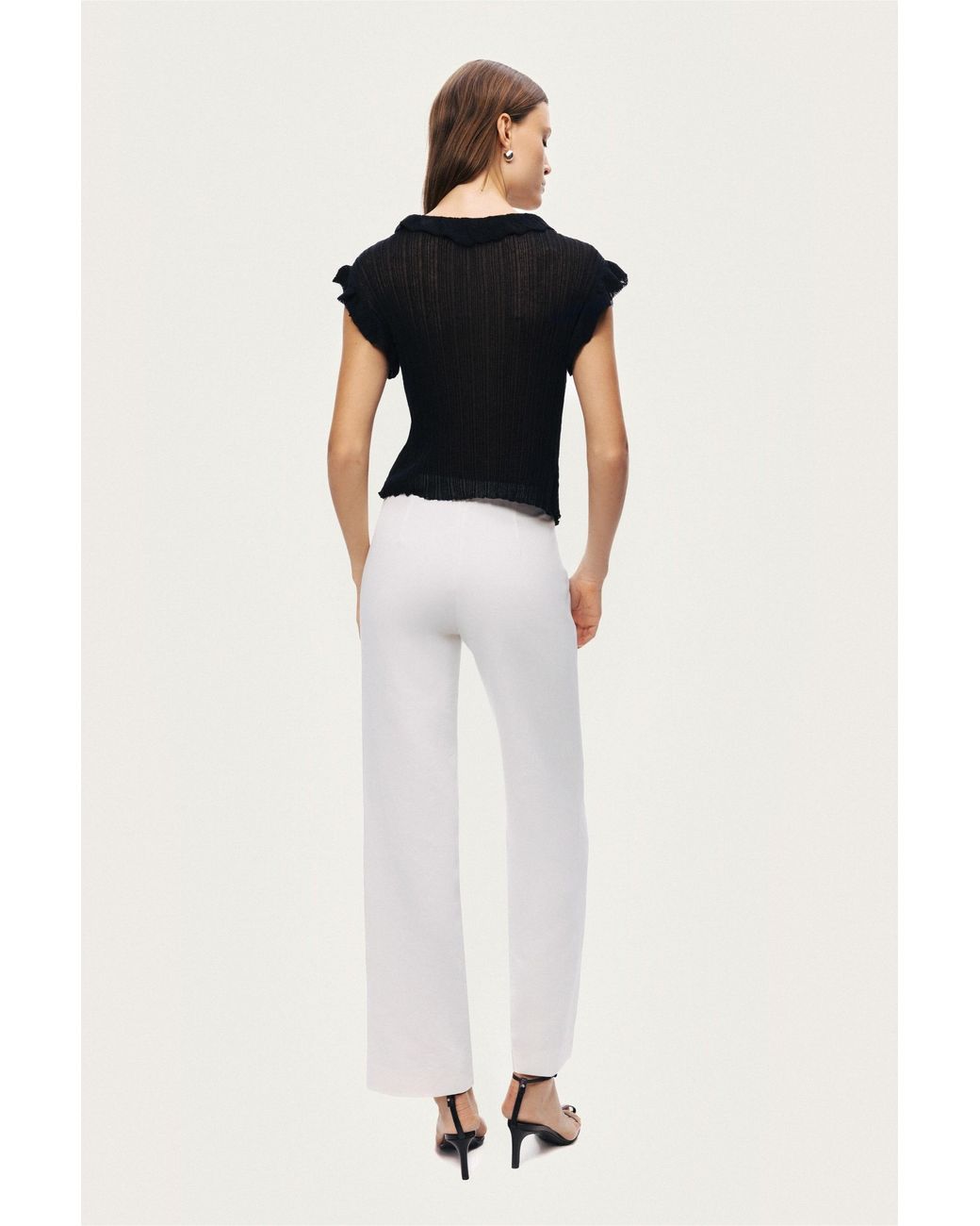 Nocturne Black Ruffled V-Neck Sheer Blouse