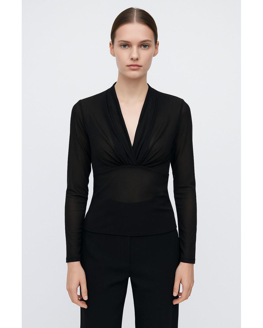 Conquista Black Long-Sleeve Top With Elegant Wrap Front