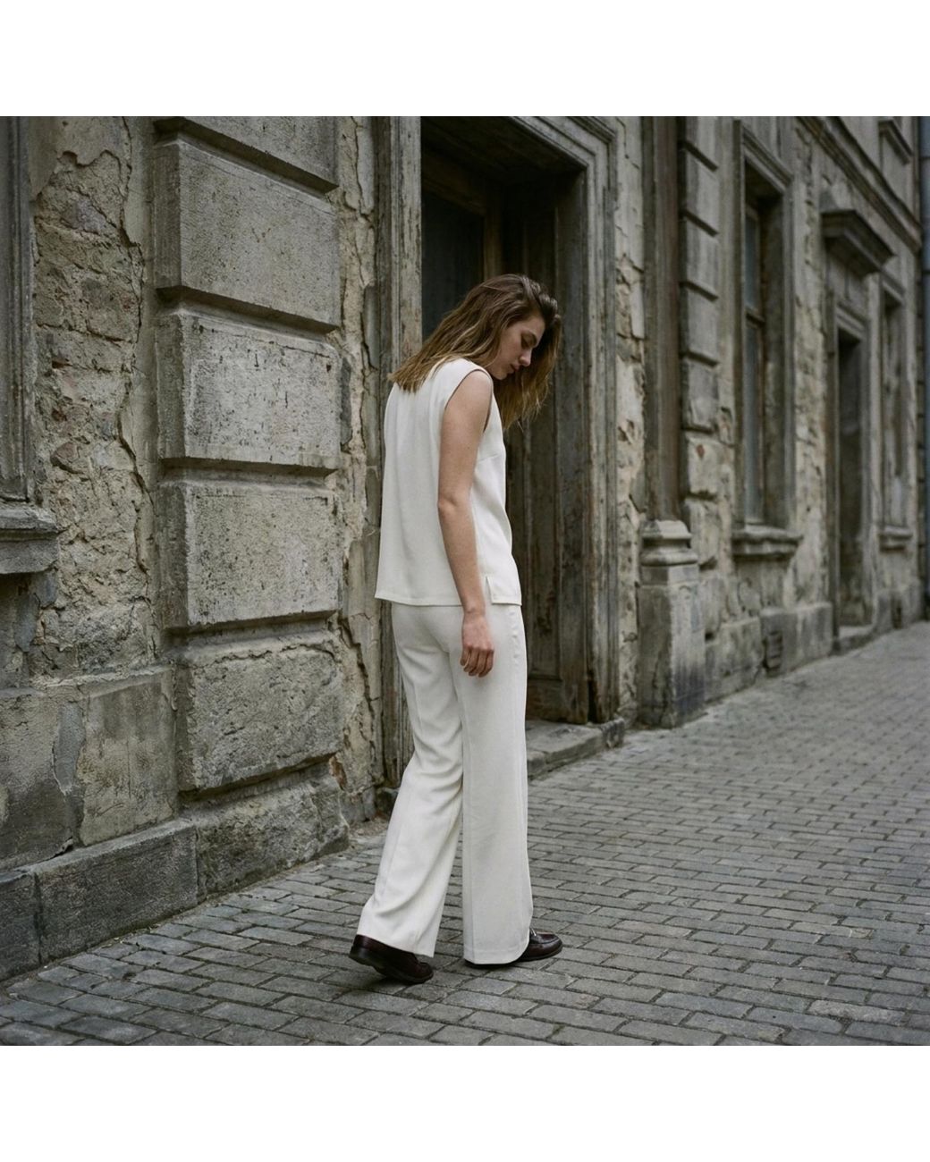 Modenaire White Sleeveless Tie Neck Blouse And Wide Leg Pant Set