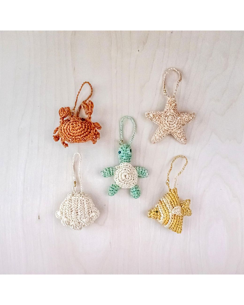 LIKHÂ Metallic Fish Raffia Bag Charm