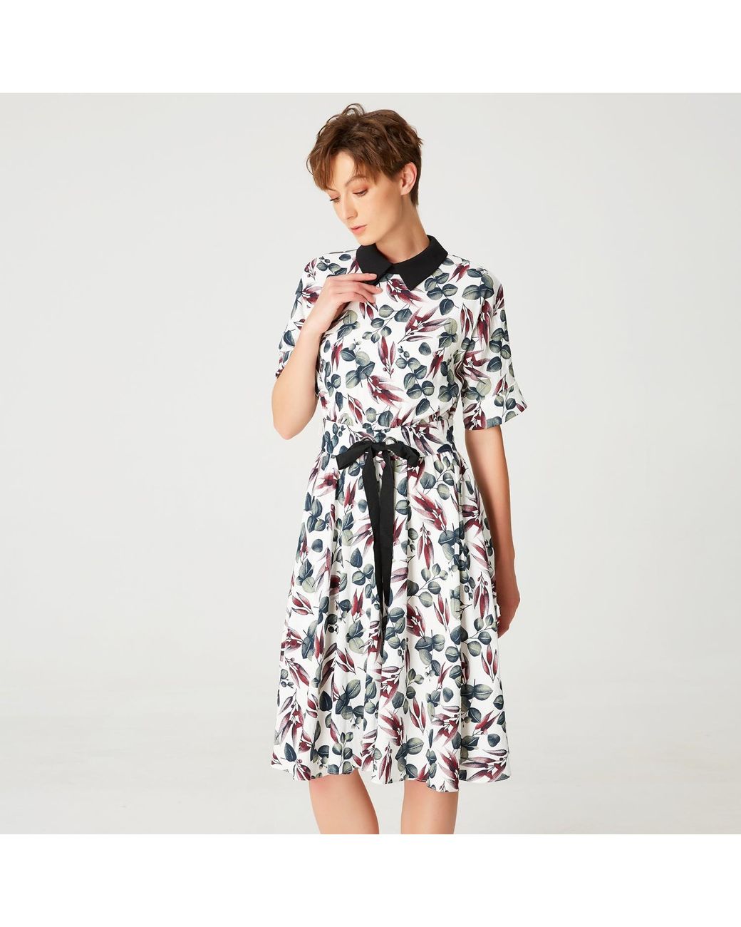 Smart and Joy White Fit-And-Flare Leaves Print Dress With Wide Belt
