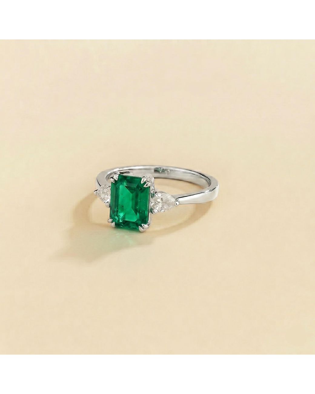 Juvetti Green Ailes Emerald Emerald-Cut Ring With Pear Side Diamonds