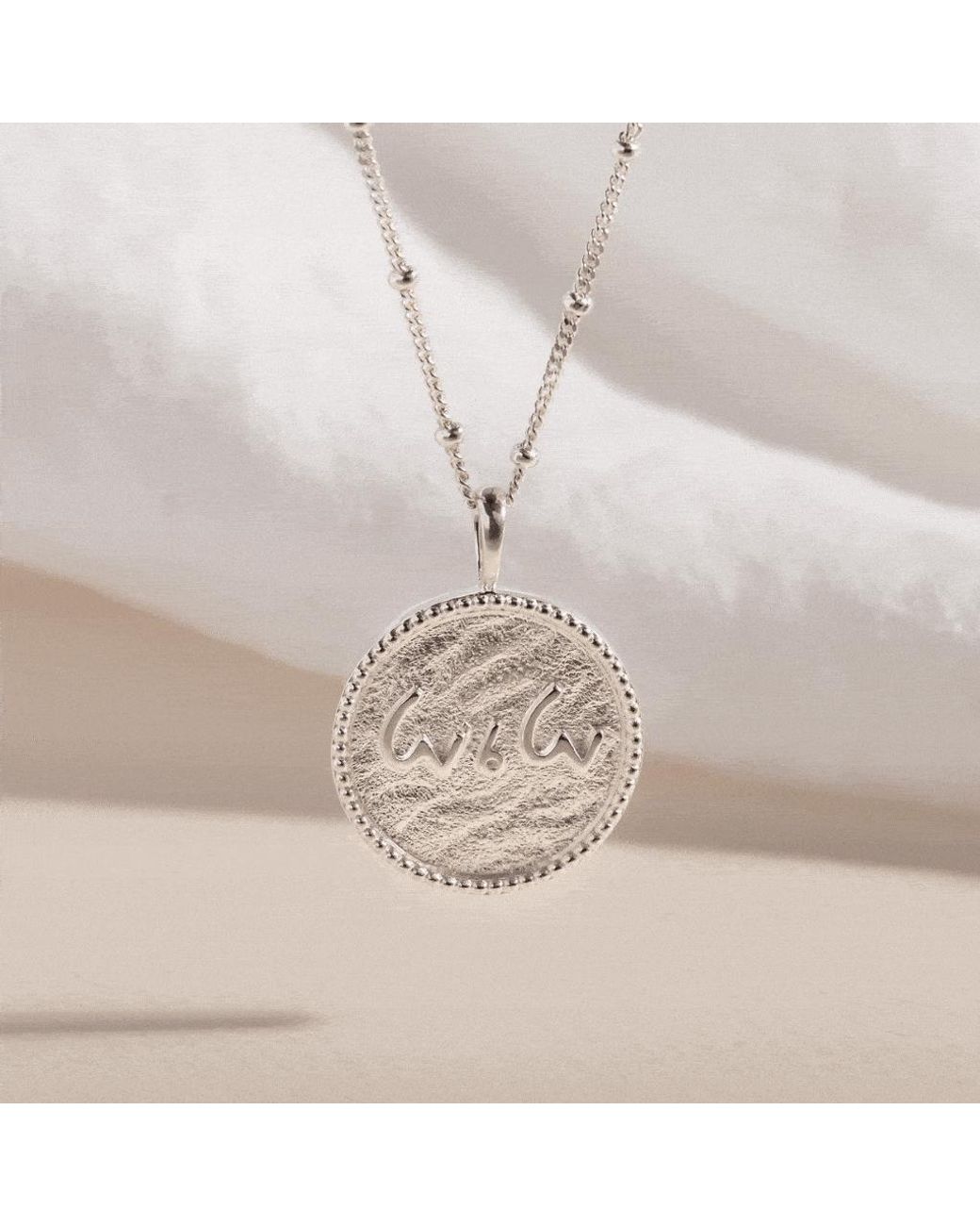 Claire Hill Designs Metallic Love Is Love Shorthand Coin Necklace