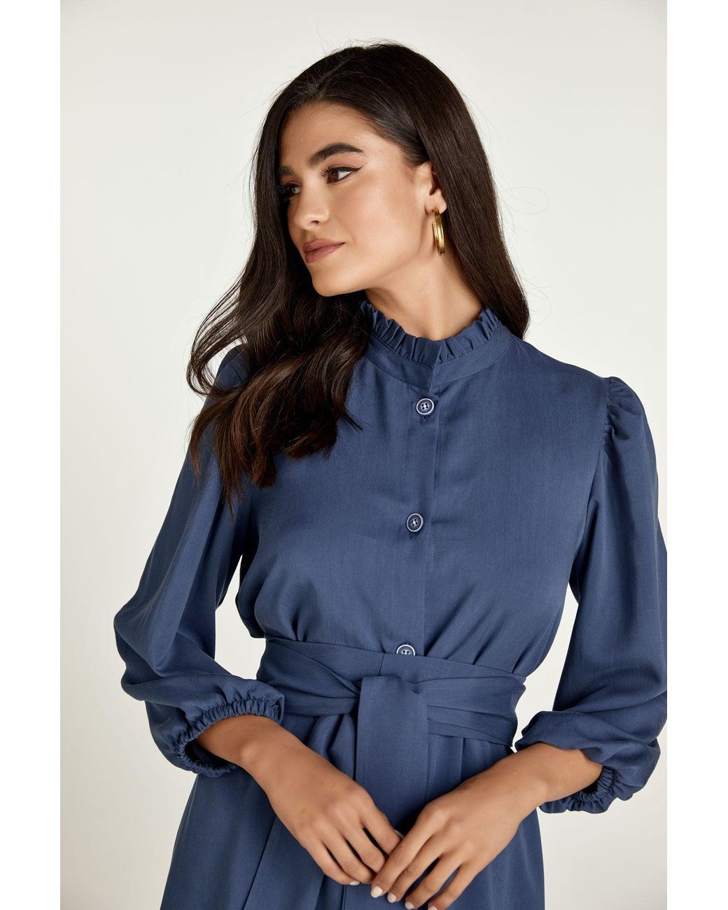 Conquista Blue Belted Long Sleeve Dress