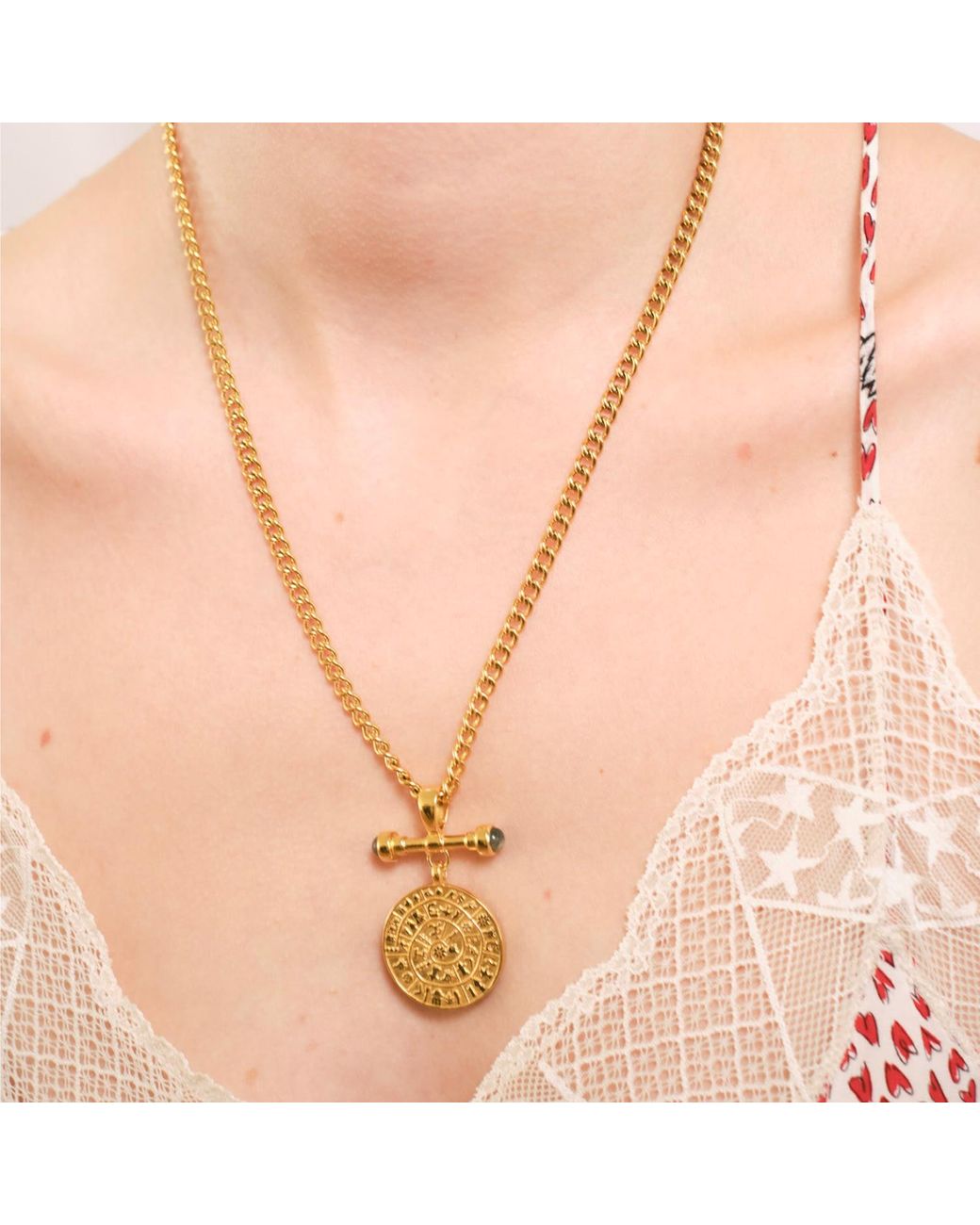 Isolated Jewellery Metallic Phaistos Disc