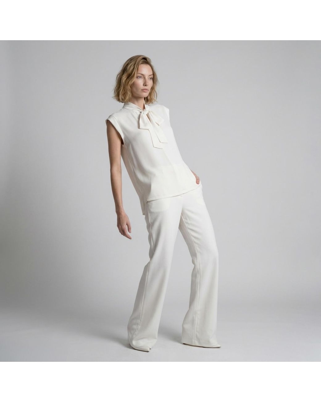 Modenaire White Sleeveless Tie Neck Blouse And Wide Leg Pant Set
