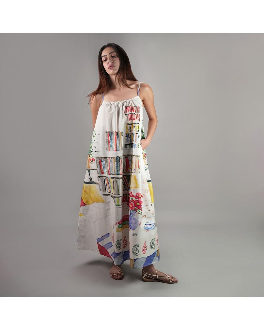 DHARA SHETH DUBAI White Abode Artistic Bookshelf Printed Spaghetti Strap Maxi Dress