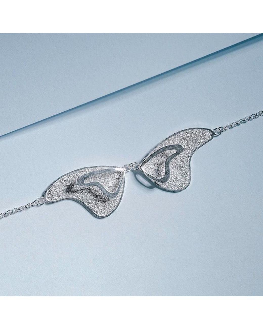 Far East Jewelry Metallic Handcrafted Love Butterfly Necklace