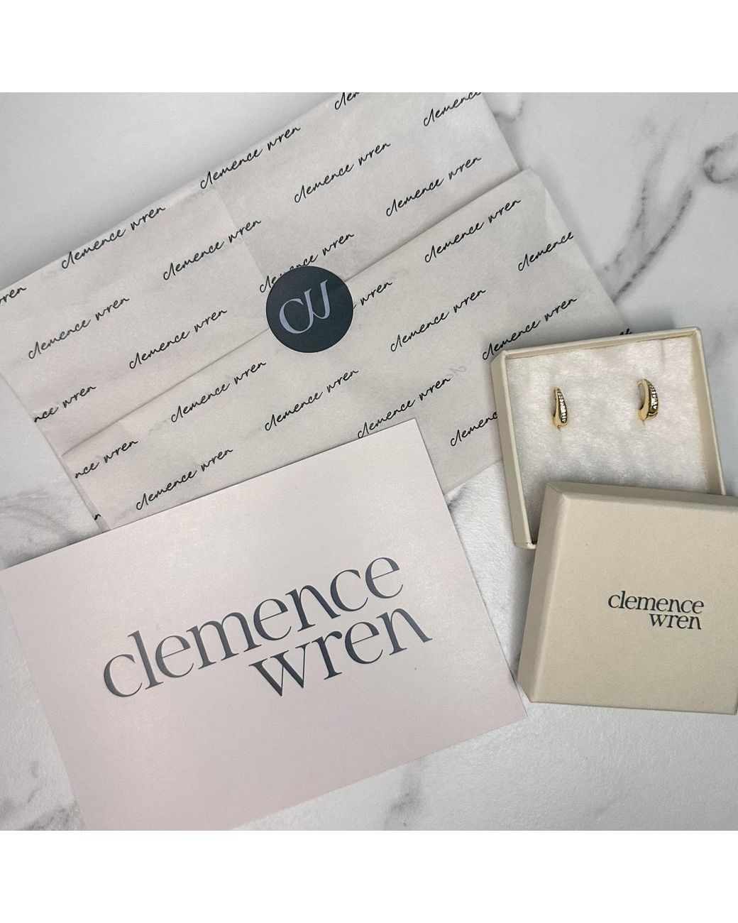 Clemence Wren Metallic Huggie Earrings With Blush Pave Gemstone Charm