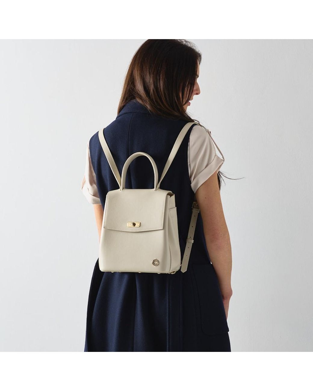 cream and black leather backpack Vrba Classic Slim The Mini Journey Backpack is handcrafted from full Leather Backpack Rucksack Von Coach
