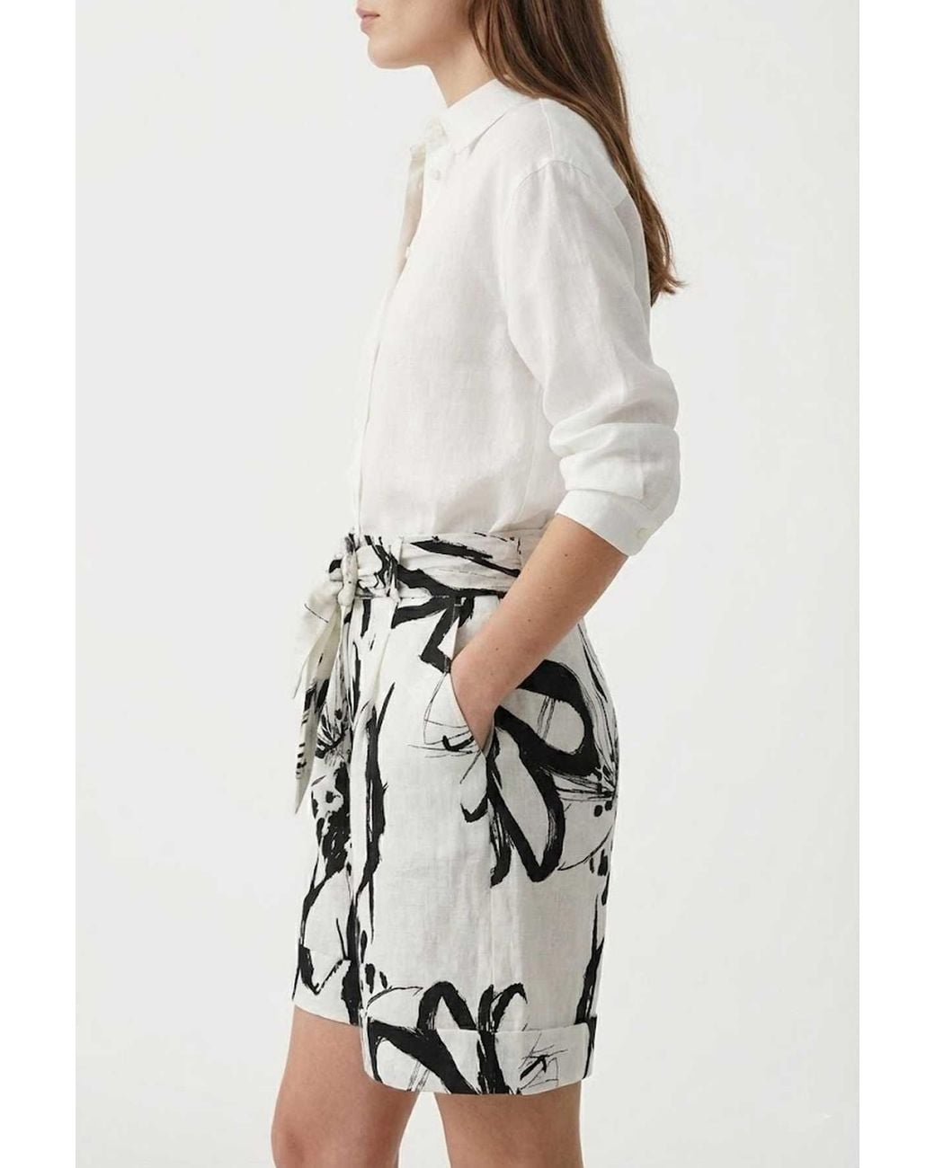 Conquista White High-Waisted Abstract Print Linen Shorts With Matching Belt