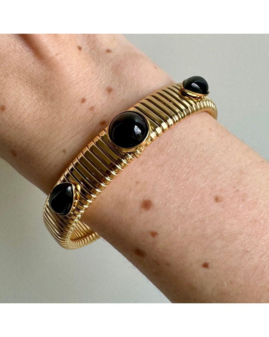 Laura Gray Metallic Round & Pear Shaped Onyx Omega Bracelet