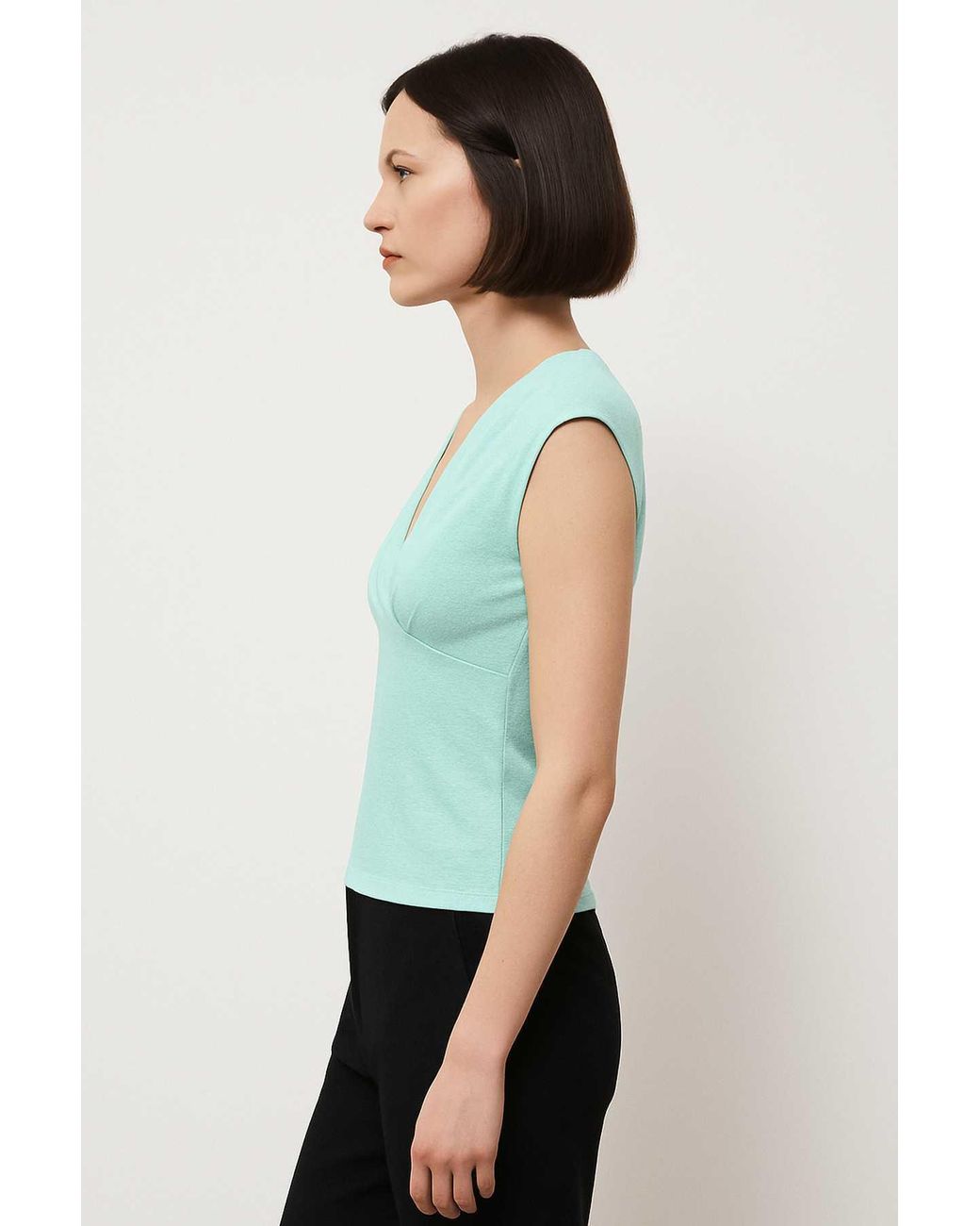 Conquista Green Deep V-Neck Sleeveless Top