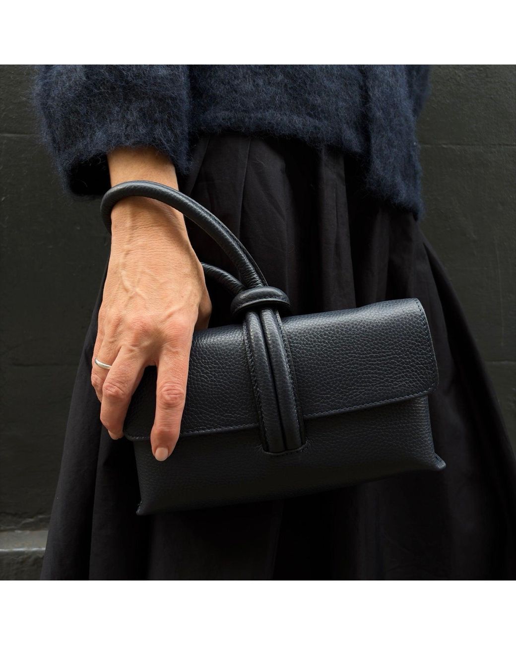 London Atelier Byproduct Blue Leather Loop Clutch Bag