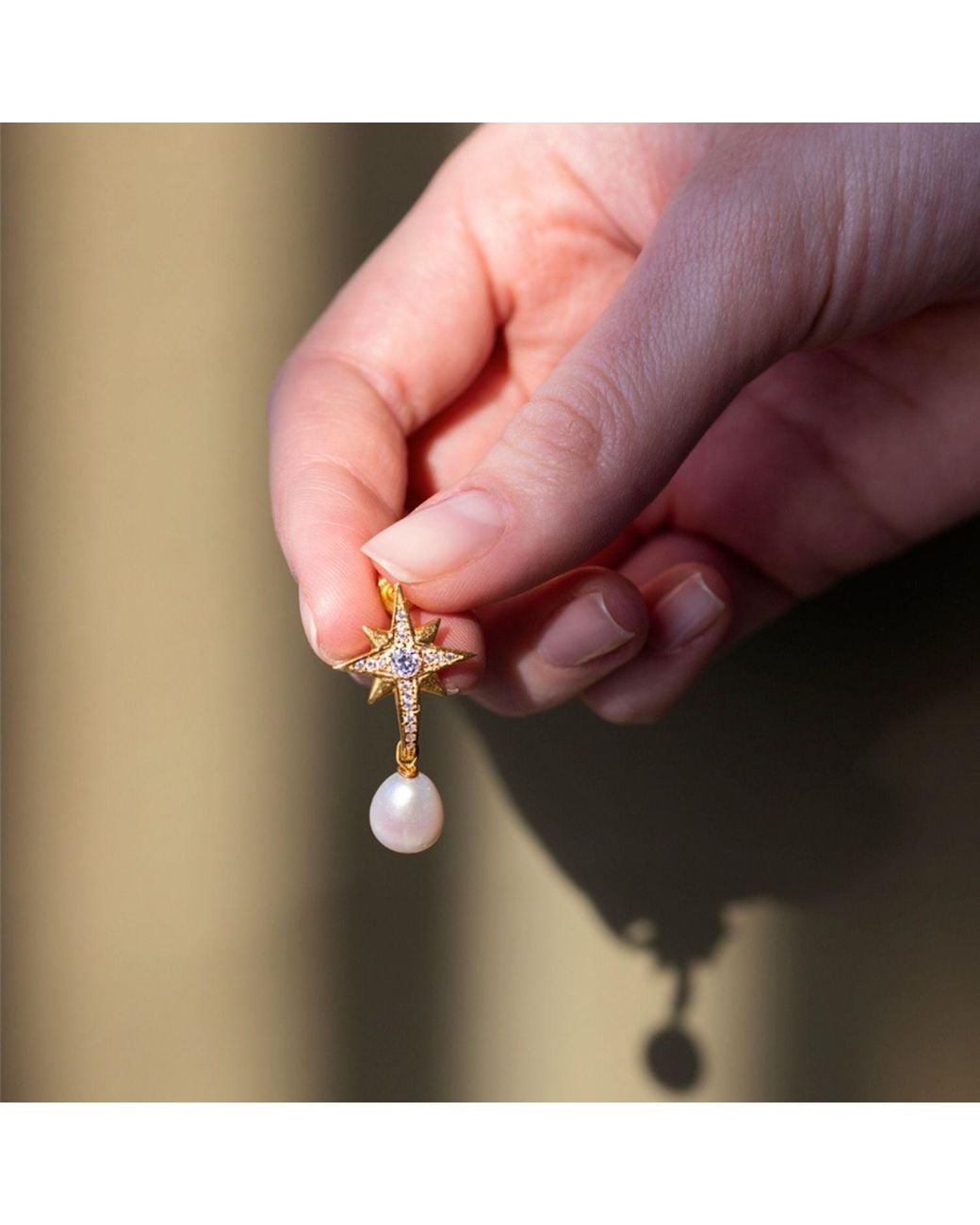 LINYA JEWELLERY Metallic Pole Star Pearl Dangle Earrings