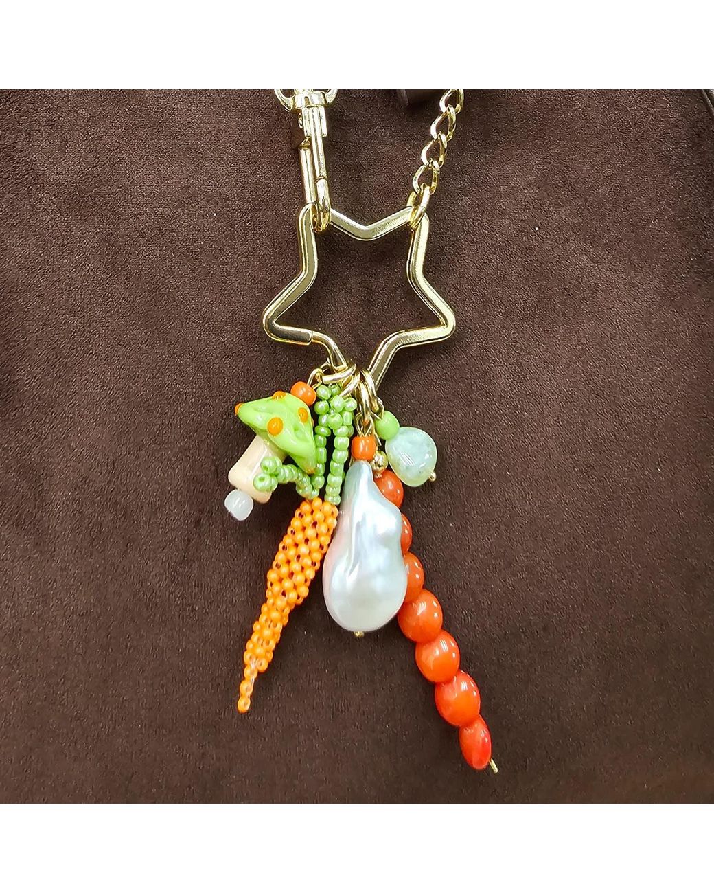 Farra Metallic Baroque Pearl Bamboo Coral And Handcrafted Carrot Bag Charm
