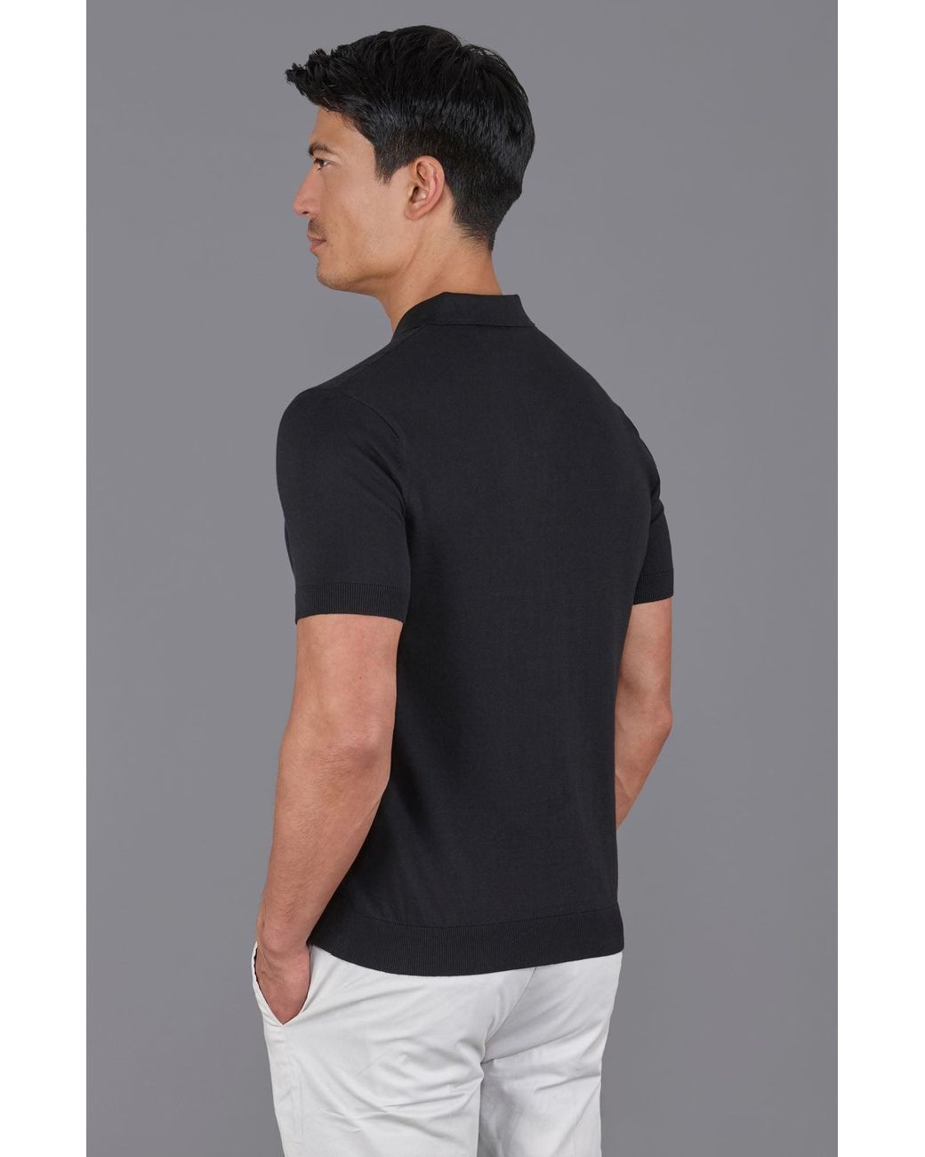 Paul James Knitwear Black Ultra Fine Cotton Miless Selection Knit Polo Shirt for men
