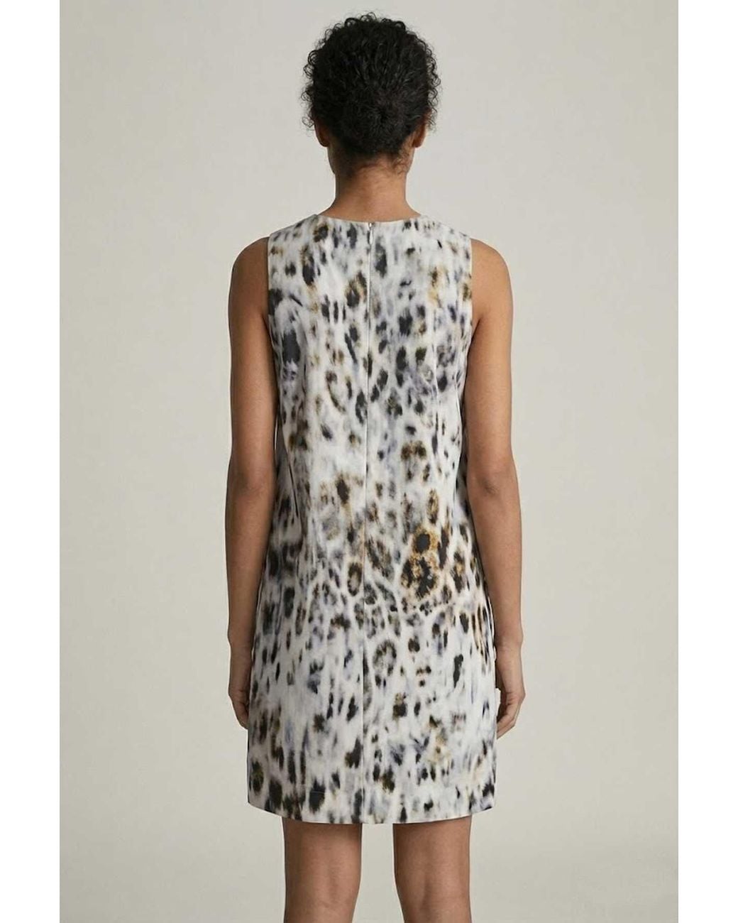 Conquista White Sleeveless Abstract Print Shift Dress
