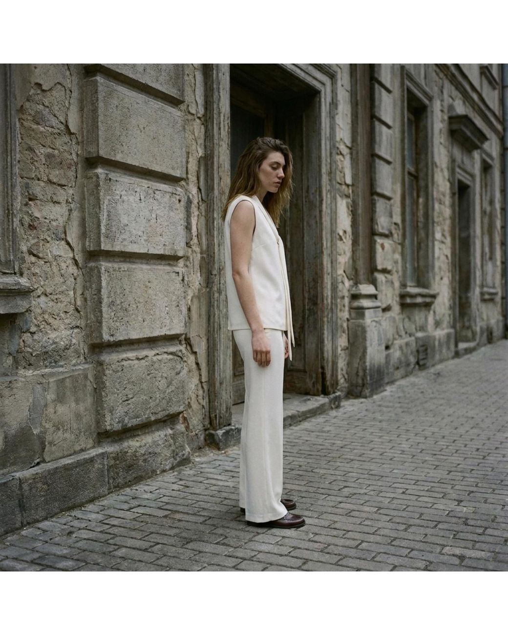 Modenaire White Sleeveless Tie Neck Blouse And Wide Leg Pant Set