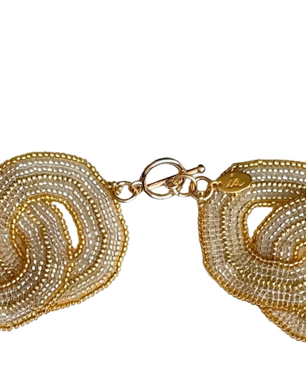 Iliana Arrazola Metallic Crisscrossed Circle Necklace, Glass Beads, Beaded Jewelry