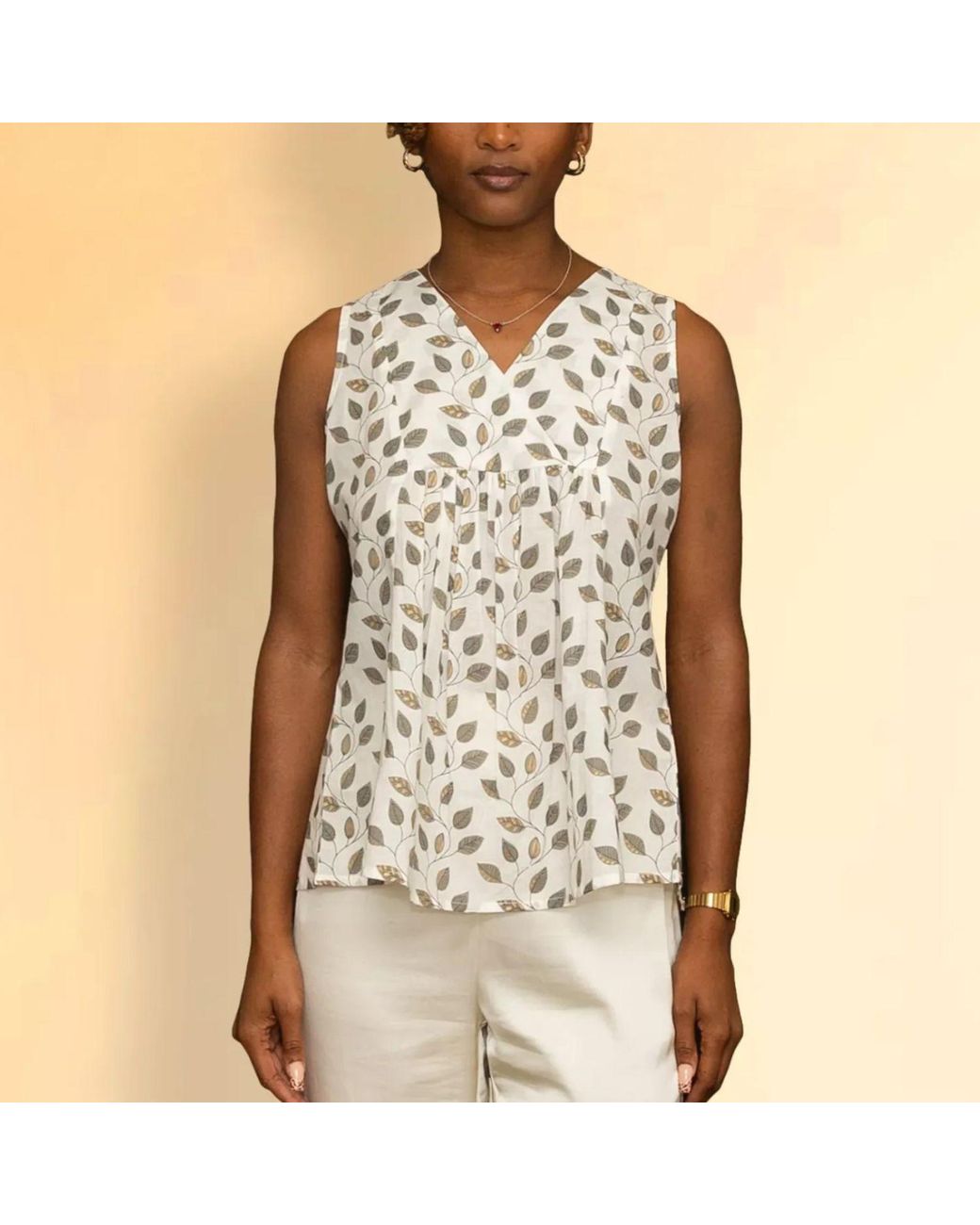 House of Gl Natural Neutrals Nira Cotton Sleeveless V-Neck Blouse With Leaf Print