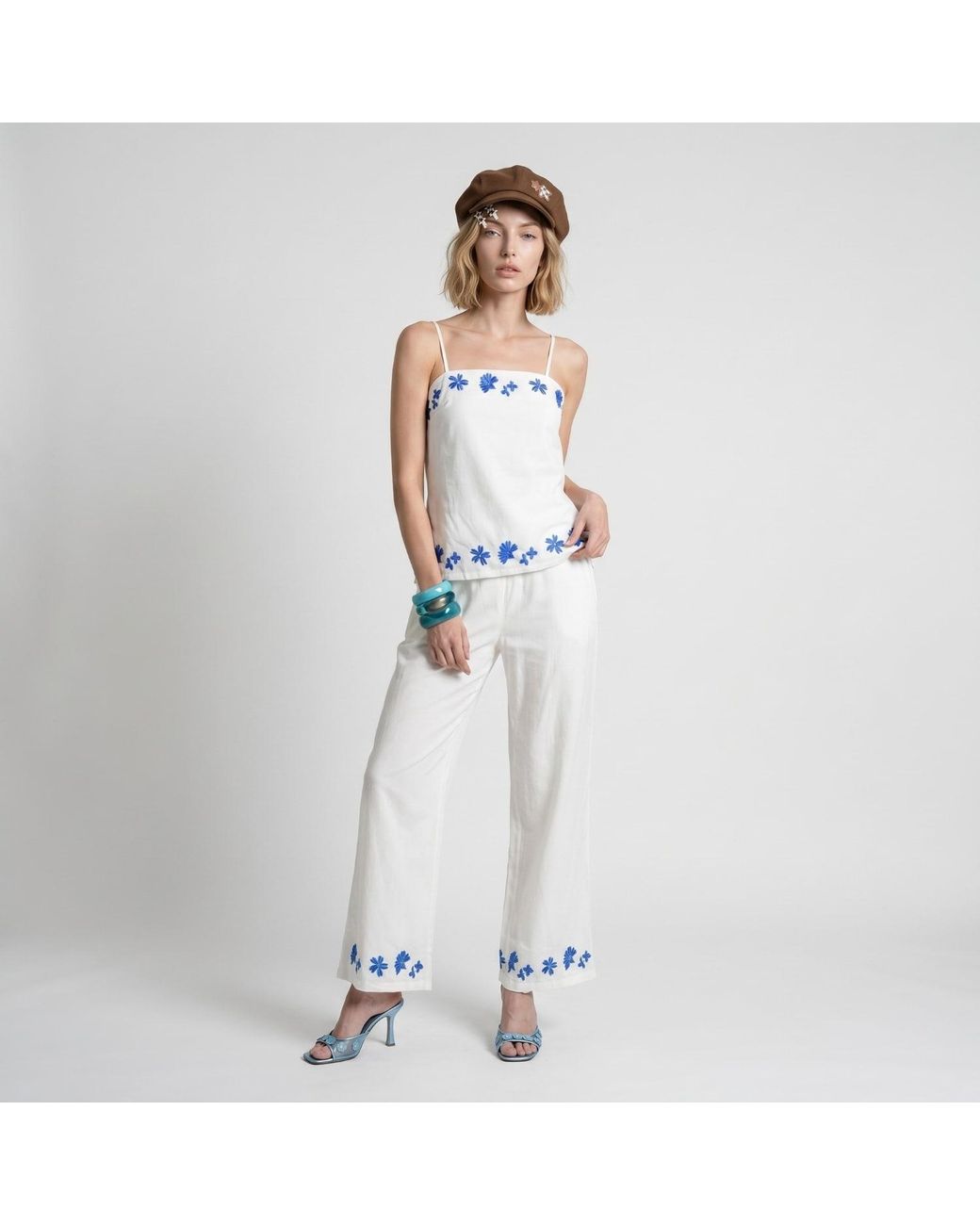 Modenaire White Floral Embroidered Two-Piece Set With Camisole And Wide-Leg Pants