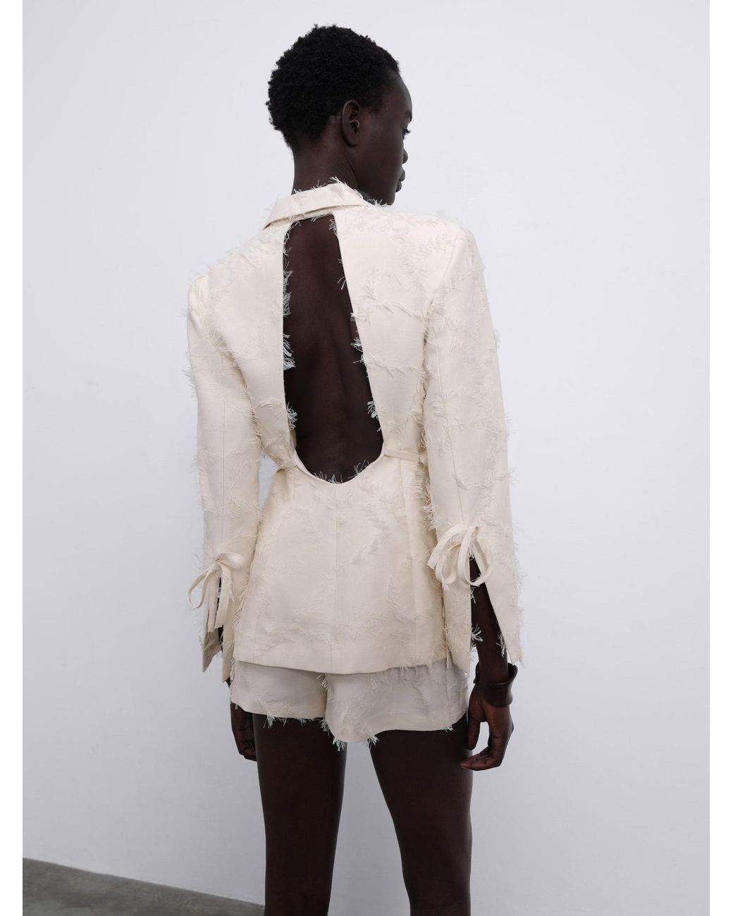 Sélone White Jora Fringe Open-Back Blazer Cream