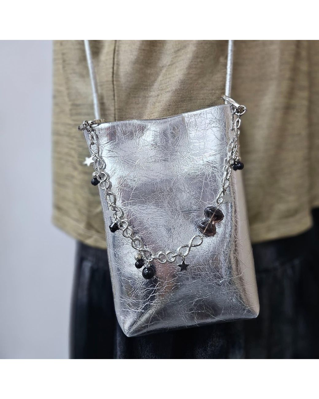 Farra Metallic Smoky Quartz Bowknot With Obsidian Chain Bag Charm