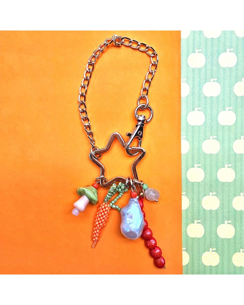 Farra Metallic Baroque Pearl Bamboo Coral And Handcrafted Carrot Bag Charm