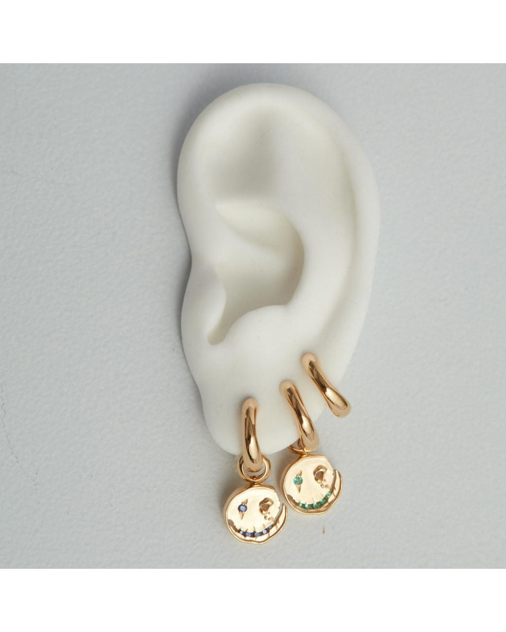 Kasun Metallic Smile Hoop Earrings – July – Ruby – Plated