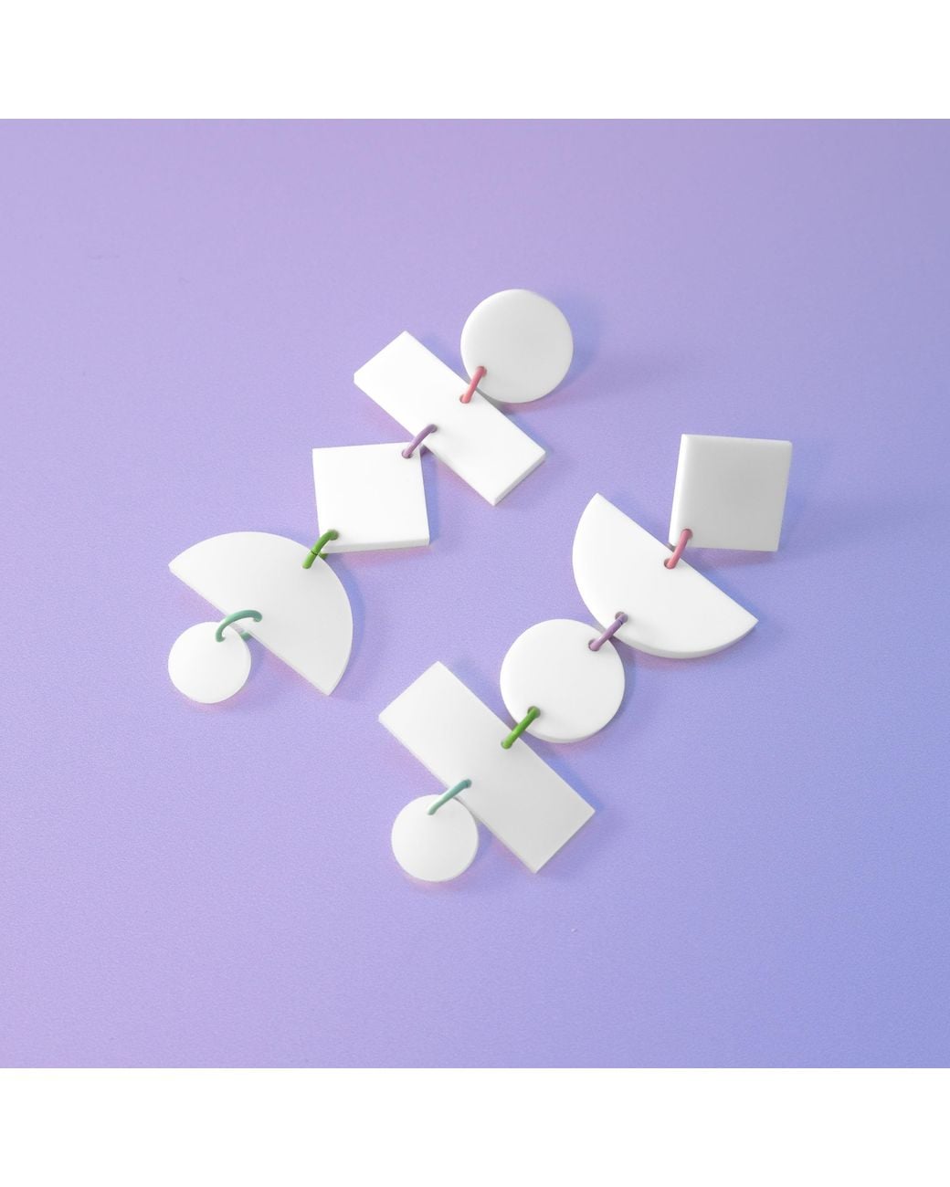 By Chavelli White Geometric Dangly Statement Earrings
