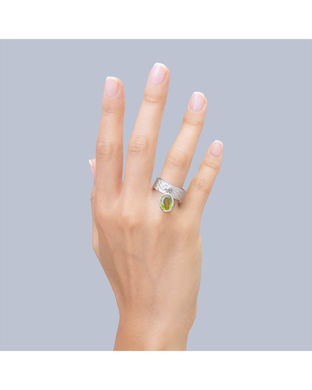 German Kabirski Multicolor Selkie Textured And Rosewood Ring With Suspended Oval Peridot