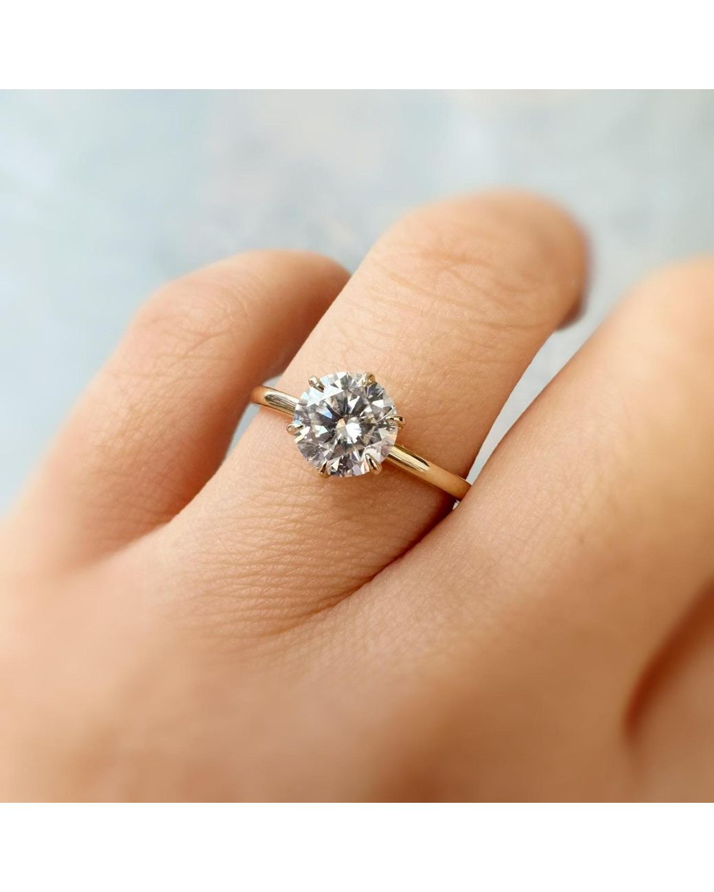 Azura Jewelry New York Metallic One Love Round Moissanite Ring Solid