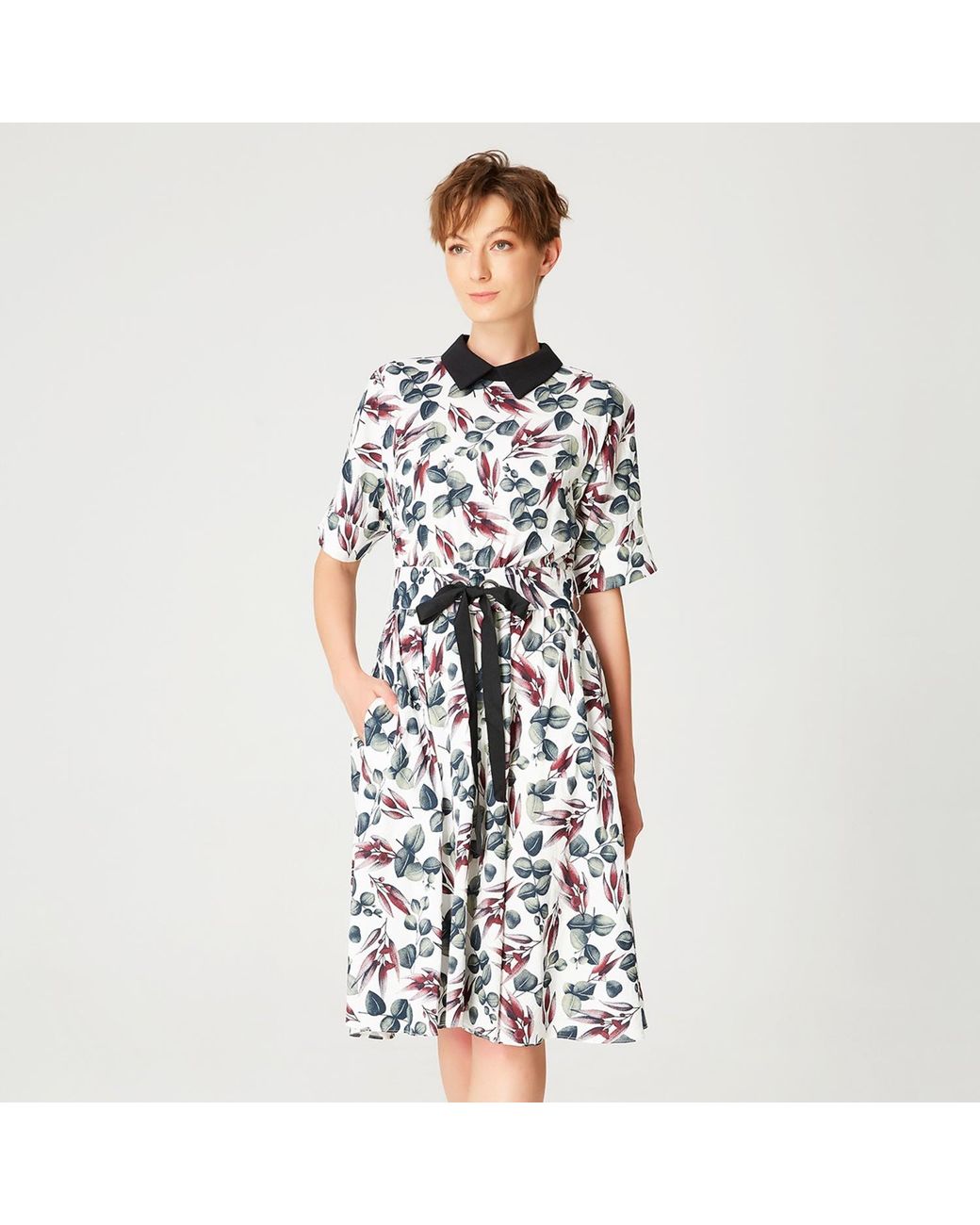 Smart and Joy White Fit-And-Flare Leaves Print Dress With Wide Belt