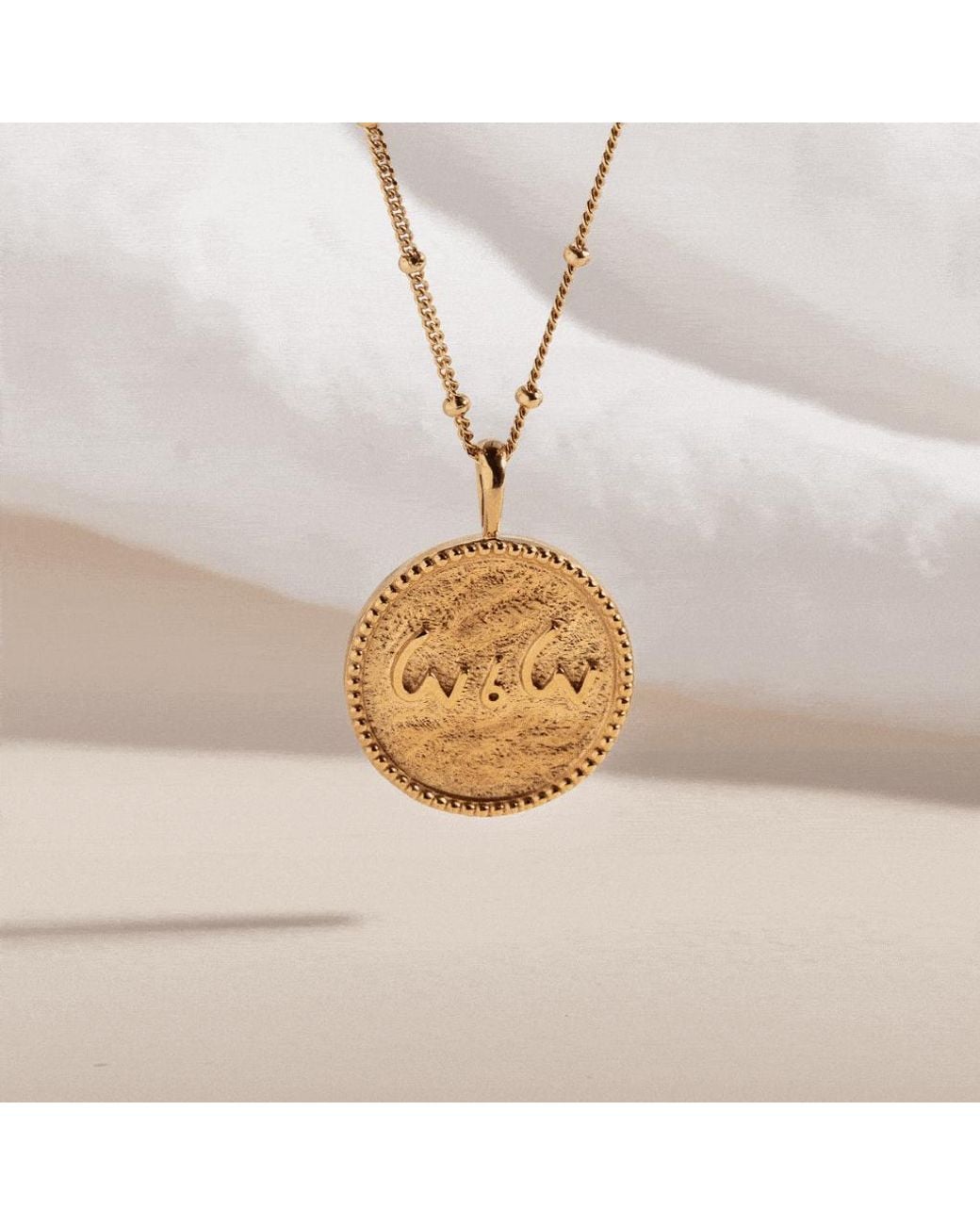 Claire Hill Designs Metallic Love Is Love Coin Necklace